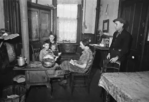 Tenements: Family in their tenement kitchen, Hamilton Co