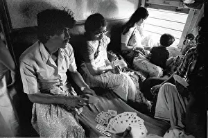 Dealing: Family on train, India