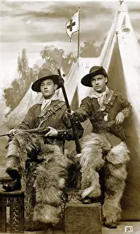 Costumed: Fancy dress - men dressed up as cowboys