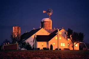 Classic Stock: Farm at Sunset Sunlight Reflecting Golden on Windows