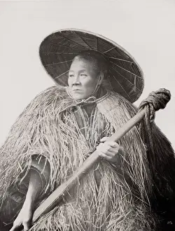 Coolie: Farm worker or coolie with grass coat, Japan