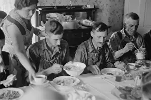 Midwest: Farm workers dinner during wheat harvest time