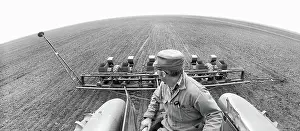 Cultivating: farmer - agriculture - tilling - field - occupations