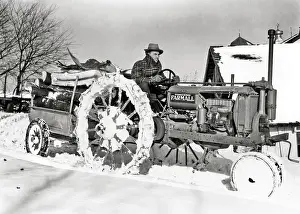 Mackinaw: Farmer Driving Tractor - Snow Chains on Tires
