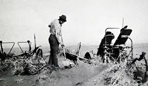 Severe: Farmer working during the Black Blizzard Dust