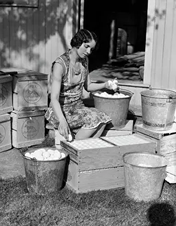 Grading: Farmer's wife sorting eggs