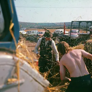 Farmhands: Two farmhands at harvest time