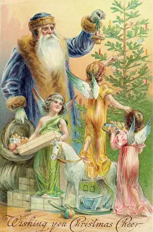 Decorates: Father Christmas decorating a Xmas tree