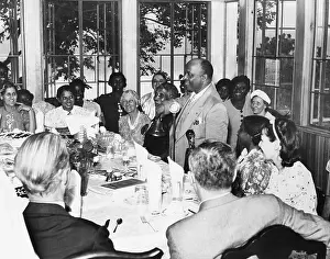 Utopian: Father Divine rings the dinner bell calling his