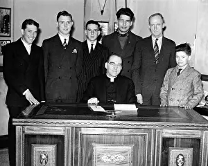 Reformers: Father Edward Flanagan proudly sits on his ?