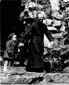 Downes: FATHER LOMBARDO & CHILD