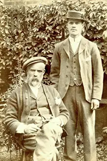 Boater: Father and son in a garden