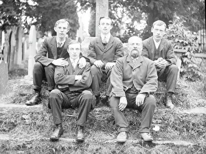 Bereavement: Father and four sons in a graveyard, Mid Wales