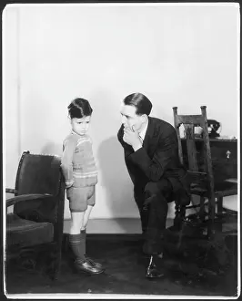 Disciplining: FATHER & SULKY BOY