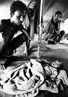 Csualpha: Father's vigil over his dying son in a refugee ?
