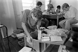Utopian: FBI agents in Jonestown, going through files ?
