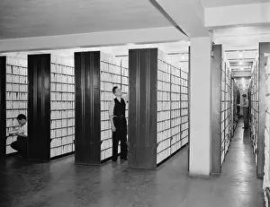 Analog: Federal workers in the patent office file room