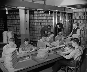 Analog: Federal workers in the patent office file room