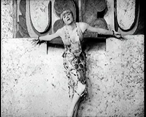 Chained: A Female Actor Chained To A Wall For A Performance