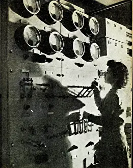 Dial: Female BBC engineer checking equipment, WW2