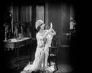 Herself: Female Civilian Seating In Front of a Dressing