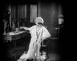 Herself: Female Civilian Seating In Front of a Dressing
