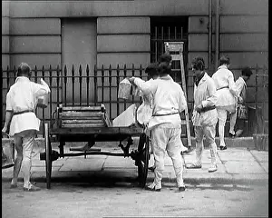 Ladders: Female Civilians With Ladders Setting Out To
