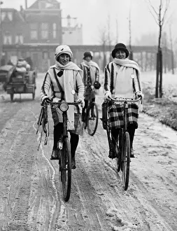 Rink: Two female cyclists in winter, 1925