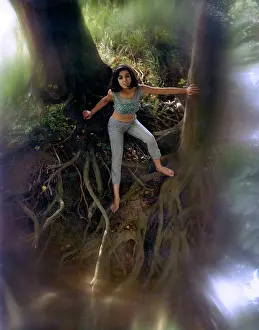 Gnarled: Female model in a wood