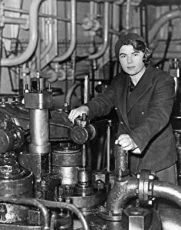 Camden: Female officer in the engine room, 1935