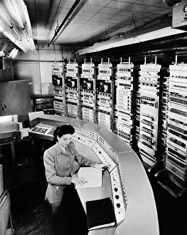 Computation: Female operator at the console of the Raydac, ?