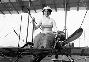Wants: Female pilot in her biplane, 1910
