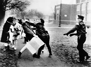 Punched: A female for school segregation punches ?