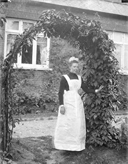 Female Servant Outside House