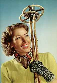 Cheesy: Female skier with her ski poles