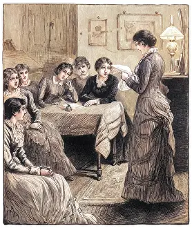 Female Students Discuss Work in the Classroom