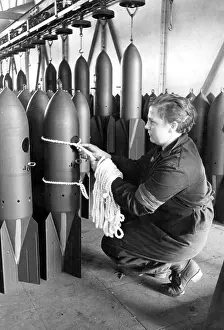 Retaining: Female worker in a munitions factory, WW2