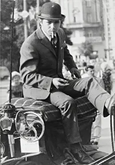 Fiaker: A Fiaker with a cigarette. About 1960. Photograph