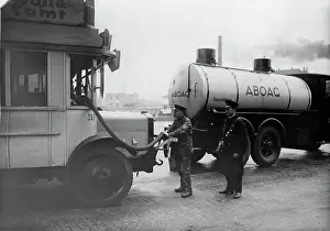 Refueling: Filling up buses in 1930