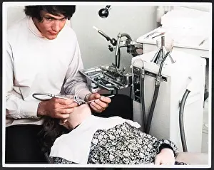Withcolourisedpic: FILLING A TOOTH