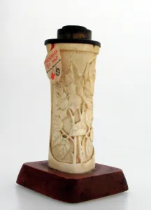 Foliate: Finely hand-carved bone candlestick by German Internee