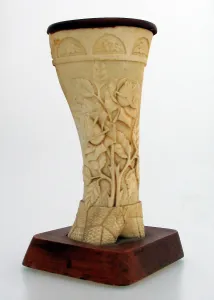 Foliate: Finely hand-carved bone ornament by German Internee