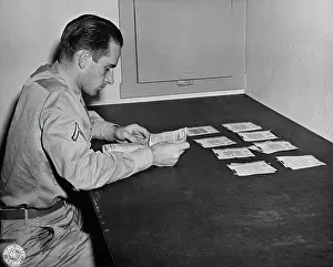 Correspondence: Finished V-mail letters are sorted and prepared
