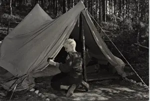 Bedtime: Finnish boy scout at camp