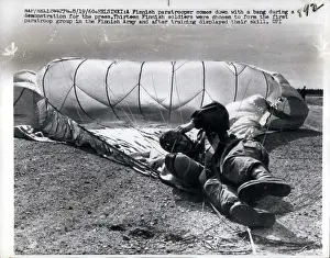Paratroop: Finnish paratrooper lands during demonstration, Helsinki
