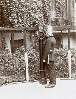 Alarms: Firefighter using telephone point in street