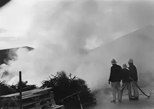 Pallets: Firefighters in action at a farm near Crediton, Devon
