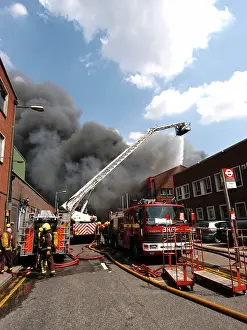 Firefighters in action at a fire, VDC House, Wembley