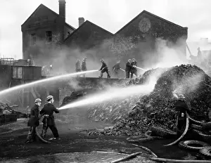 Damping: Firefighters in action, Mitre Wharf, Scrubs Lane, NW10