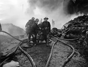Damping: Firefighters in action, Mitre Wharf, Scrubs Lane, NW10